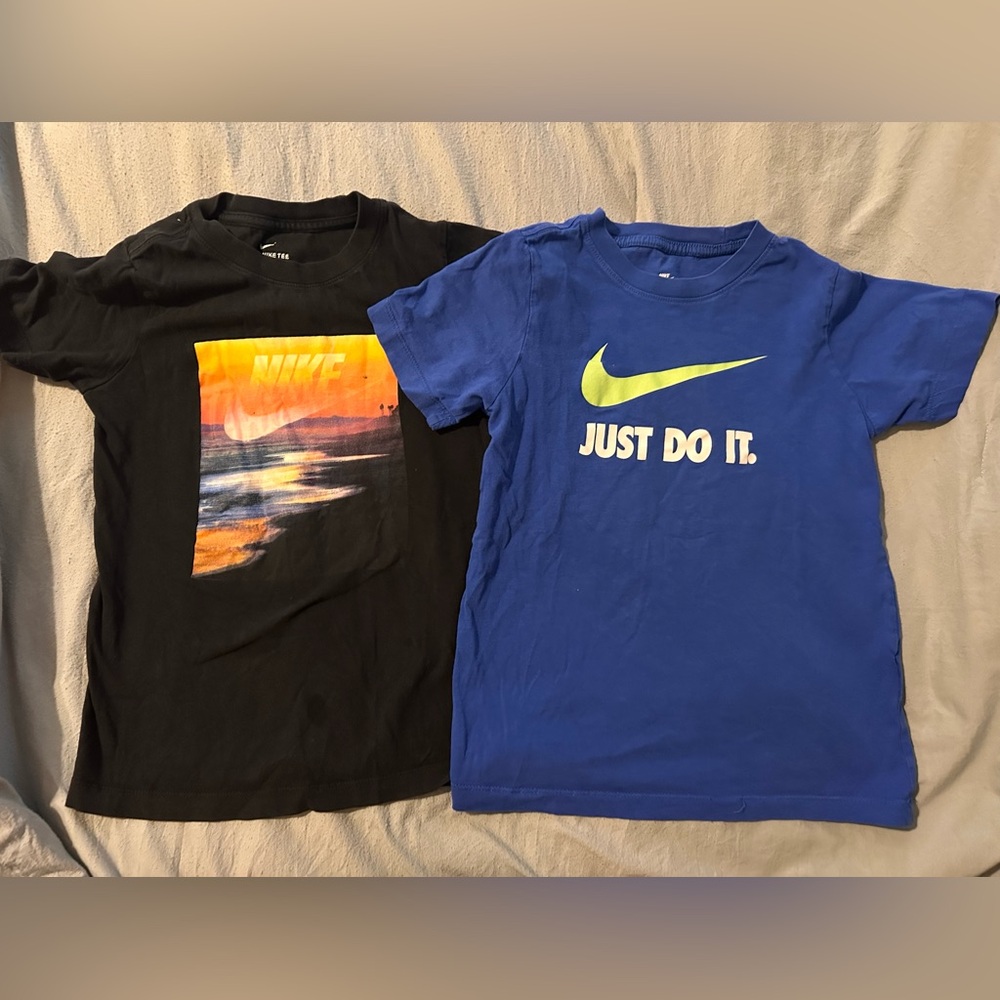Two Boys size small Nike shirts